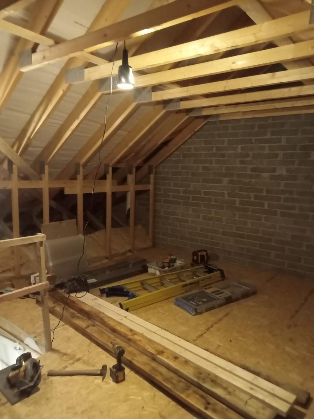 Roof truss carpentry installation by A Cut Above Carpentry
